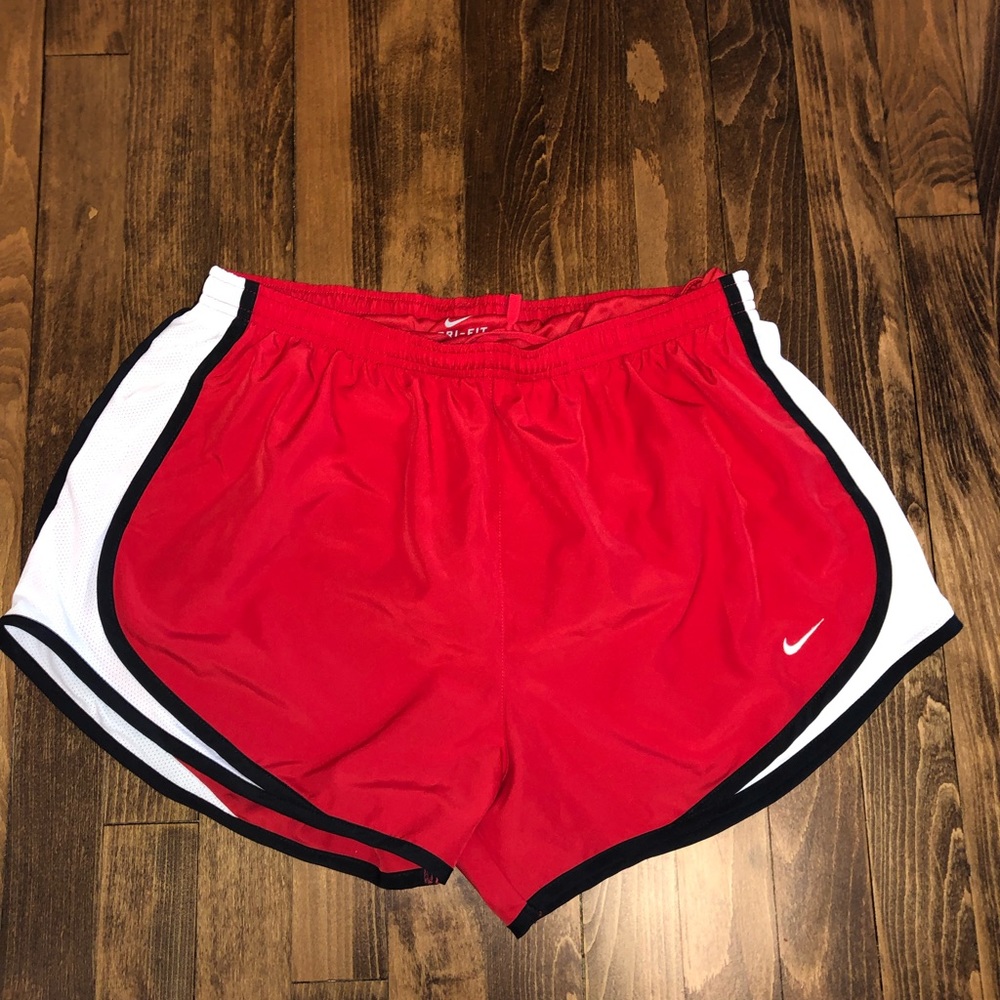 Red Nike running shorts